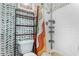 Bathroom featuring patterned wallpaper, a modern toilet, and a shower with a colorful curtain at 4022 W Kaler Dr, Phoenix, AZ 85051