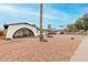 Charming single story home featuring unique arched covered parking at 4022 W Kaler Dr, Phoenix, AZ 85051