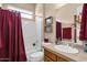 Bathroom featuring a shower-tub combination, neutral color palette, and sink with vanity at 4221 E Sourwood Dr, Gilbert, AZ 85298