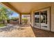 A covered patio leads to an outdoor kitchen with built-in barbecue, offering outdoor living and entertaining at 4221 E Sourwood Dr, Gilbert, AZ 85298