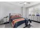 Neutral toned bedroom featuring two side tables and lamps and a dresser with shuttered blinds at 4455 S Matter --, Mesa, AZ 85212