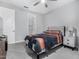 Modern bedroom with neutral walls, carpet, updated bed and bedding, and a side table at 4455 S Matter --, Mesa, AZ 85212