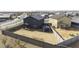 Aerial view of a private backyard with block fencing and detached shed at 47558 W Mellen Ln, Maricopa, AZ 85139