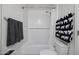 This full bathroom has white subway tiles and a modern shower at 47558 W Mellen Ln, Maricopa, AZ 85139