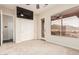 Carpeted bedroom featuring natural light, mountain views, and closet at 4822 S Gold Canyon Dr, Gold Canyon, AZ 85118