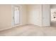 Tan bedroom with a closet and a door to the outdoor space at 4822 S Gold Canyon Dr, Gold Canyon, AZ 85118