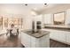 Kitchen island with cooktop and stainless appliances and dining area at 4822 S Gold Canyon Dr, Gold Canyon, AZ 85118