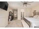 Main bedroom showcasing a fireplace, dresser, and entry to the hallway at 4822 S Gold Canyon Dr, Gold Canyon, AZ 85118