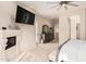 Spacious main bedroom featuring a fireplace and a view into the en-suite bathroom at 4822 S Gold Canyon Dr, Gold Canyon, AZ 85118