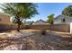 Low maintenance backyard featuring a brick patio and desert landscaping at 5021 W Chicago N Cir, Chandler, AZ 85226