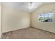 Bright bedroom with a large window and neutral walls at 5021 W Chicago N Cir, Chandler, AZ 85226