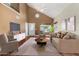 Bright living room featuring high ceilings, and neutral decor, creating an inviting atmosphere at 5021 W Chicago N Cir, Chandler, AZ 85226