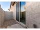 Cozy outdoor patio featuring a sliding glass door entry and enclosed by a block wall at 5474 W Fulton St, Phoenix, AZ 85043