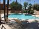 Sparkling community pool with lounge chairs for relaxing and enjoying the sunshine at 5640 E Bell Rd # 1081, Scottsdale, AZ 85254