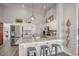 Kitchen featuring granite counters, stainless steel appliances, and a breakfast bar at 5951 E Inglewood St, Mesa, AZ 85205