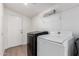 Laundry room features a washer and dryer, along with a door leading to the outside at 6901 W Patricia Ann Ln, Peoria, AZ 85382