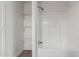 Shower stall features updated hardware, a shower head, and built-in shelving at 6901 W Patricia Ann Ln, Peoria, AZ 85382