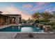 Tranquil backyard features a pool, spa, mature trees, and a covered patio perfect for outdoor relaxation at 7363 E Lower Wash Pass, Scottsdale, AZ 85266