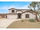 Charming two-story home featuring a well-maintained yard and a welcoming entrance at 7387 W Remuda Dr, Peoria, AZ 85383