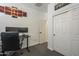 This bedroom features neutral walls and carpet, and a closet for storage at 7525 W Springfield Way, Florence, AZ 85132