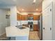 Modern kitchen featuring stainless steel appliances, white subway tile backsplash, and light countertops at 7525 W Springfield Way, Florence, AZ 85132