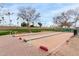 Gather friends for a game on the bocce ball court, surrounded by mature trees and landscaping at 7750 E Broadway Rd # 54, Mesa, AZ 85208