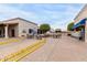 Outdoor seating area with tables and string lights, great for relaxing and entertaining at 7750 E Broadway Rd # 54, Mesa, AZ 85208