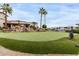 Practice your putting on this well-maintained green, surrounded by palm trees and community features at 7750 E Broadway Rd # 54, Mesa, AZ 85208