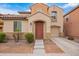 Charming two-story home with a tile roof, landscaped yard, and a two-car garage at 7840 W Bonitos Dr, Phoenix, AZ 85035