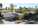 Aerial view of the property, highlighting the golf course, mountain views, and lush surroundings at 8005 N Via De Lago --, Scottsdale, AZ 85258