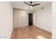 Bedroom features wood floors, ceiling fan, closet and recessed lighting at 8005 N Via De Lago --, Scottsdale, AZ 85258