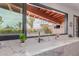 Kitchen with a view to the backyard, featuring marble countertops and a black window frame at 8005 N Via De Lago --, Scottsdale, AZ 85258