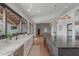 Bright kitchen with a marble countertop, large windows offering backyard views, and modern fixtures at 8005 N Via De Lago --, Scottsdale, AZ 85258