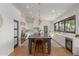 Modern kitchen featuring a large center island, stainless steel appliances, and bright natural light at 8005 N Via De Lago --, Scottsdale, AZ 85258