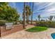 Outdoor grill area with brick surround, perfect for entertaining in the backyard at 8005 N Via De Lago --, Scottsdale, AZ 85258