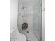 Bathroom features decorative tile, marble walls, and a glass shower stall at 8335 E Montecito Ave, Scottsdale, AZ 85251