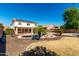 Spacious backyard featuring a pool, mature trees, and plenty of room to enjoy outdoor living at 835 E Stirrup Ln, San Tan Valley, AZ 85143