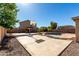 Spacious backyard featuring a basketball court, pool, mature landscaping and playhouse at 835 E Stirrup Ln, San Tan Valley, AZ 85143