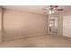 View of a bathroom with neutral carpeting and a bathtub at 835 E Stirrup Ln, San Tan Valley, AZ 85143