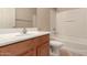 Bathroom featuring vanity, toilet, and tub with shower at 835 E Stirrup Ln, San Tan Valley, AZ 85143