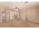 This is a view of a bonus room featuring neutral carpeting at 835 E Stirrup Ln, San Tan Valley, AZ 85143