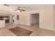 Open living area with tile flooring, neutral walls, and a ceiling fan for added comfort at 835 E Stirrup Ln, San Tan Valley, AZ 85143