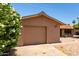 Single-story home with an attached garage and a low-maintenance front yard with rock landscaping at 8538 E Vista Dr, Scottsdale, AZ 85250