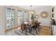 Elegant dining room with hardwood floors and modern decor at 8709 E Mackenzie Dr, Scottsdale, AZ 85251