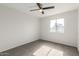 Bright bedroom with neutral walls, plush carpeting, and a bright window at 9033 N 15Th Dr, Phoenix, AZ 85021