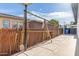 Fenced yard with a concrete pathway that provides privacy and security at 9033 N 15Th Dr, Phoenix, AZ 85021