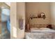 Serene bathroom featuring a separate shower and soaking tub with tiled accents at 9280 E Thompson Peak Pkwy # 25, Scottsdale, AZ 85255