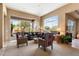 Open concept living room with scenic view and comfortable seating at 9280 E Thompson Peak Pkwy # 25, Scottsdale, AZ 85255