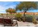 Inviting outdoor patio with seating, offering serene desert views and access to nearby golf at 9280 E Thompson Peak Pkwy # 25, Scottsdale, AZ 85255