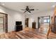 Expansive bedroom with wooden floors and large doorway, perfect for a relaxing retreat at 9331 E La Posada Ct, Scottsdale, AZ 85255